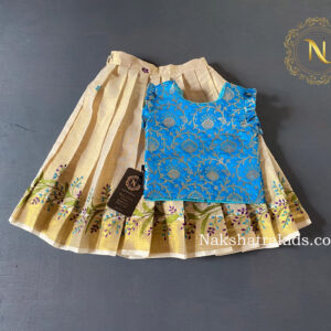 blue bannarasi top with kasav embroidery skirt