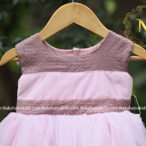 Pastel pink tulle net frock with pastel lavender embroidery fabric on neckline and waistline Kidswear Online