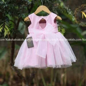 Pastel pink tulle net frock with pastel lavender embroidery fabric on neckline and waistline Kidswear